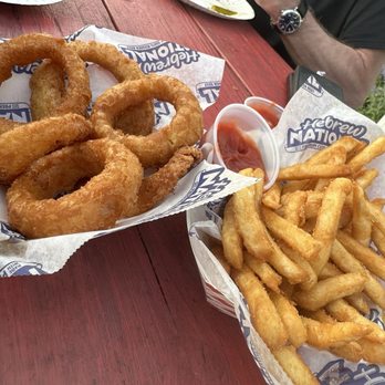 Jake's Diggity Dogs - Onion rings (left) and French Fries (right) - Hot Dogs Near Me - Milford, Connecticut Jake's Diggity Dogs - Onion rings (left) and French Fries (right) - Hot Dogs Near Me - Milford, Connecticut