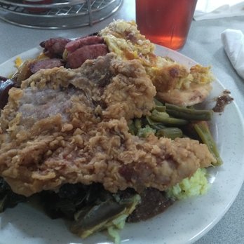 Roger's Barbque House - Huge over cooked pork chop.  If you love to really CHEW AND CHEW then this was the meal for your enjoyment. - Barbeque Near Me - Florence, South Carolina