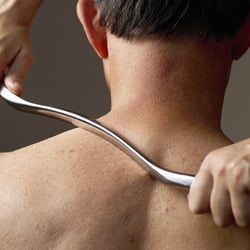 Mike Yusim, DC - Greenway Chiropractic - Graston technique on a patient with neck and shoulder pain.