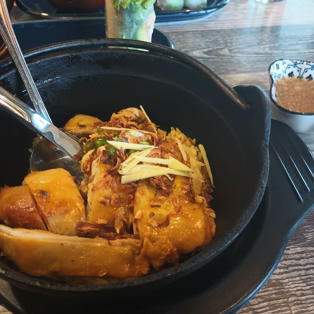 Papaya - Coconut chicken Iron Pot.. Ginger sauce.. - Vietnamese Near Me - Renton, Washington