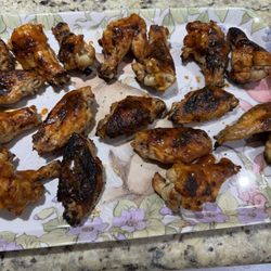 Idylwilde Farm - Wings covered in 6 year old sauce.