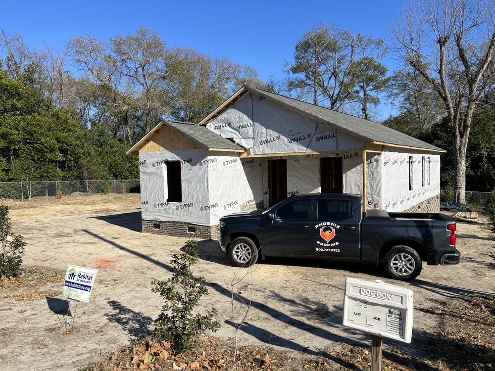 Slide of Phoenix Roofing