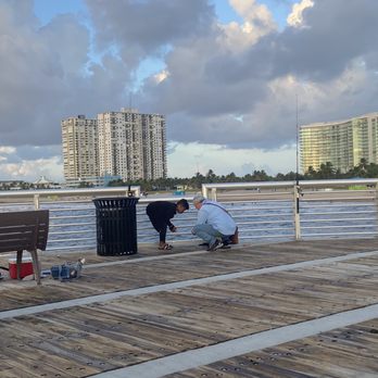 Home2 Suites by Hilton Pompano Beach Pier - Pier- lots of people fishing during the sun rise - Hotels Near Me - Pompano Beach, Florida Home2 Suites by Hilton Pompano Beach Pier - Pier- lots of people fishing during the sun rise - Hotels Near Me - Pompano Beach, Florida