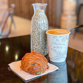 Cubico Coffee - a croissant and a cup of coffee - Coffee & Tea Near Me - Davie, Florida