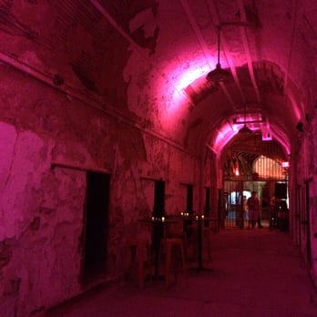 Eastern State Penitentiary - Walking to Al Capone's cell with a drink in hand. Make sure to peek in the dark, empty cells along the way, creepy! - Landmarks & Historical Buildings Near Me - Philadelphia, Pennsylvania Eastern State Penitentiary - Walking to Al Capone's cell with a drink in hand. Make sure to peek in the dark, empty cells along the way, creepy! - Landmarks & Historical Buildings Near Me - Philadelphia, Pennsylvania