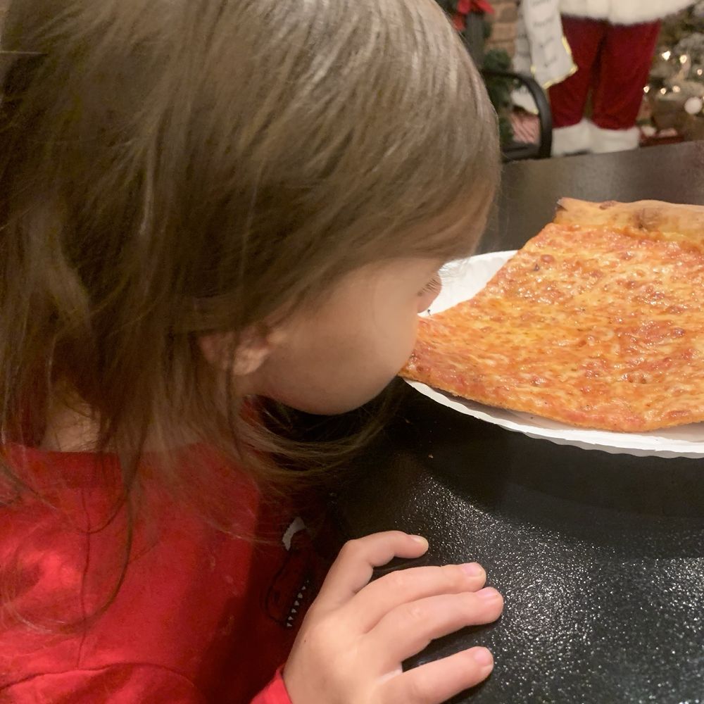 Slice 420 - Serena found a way to eat without having to pick her pizza up. - Pizza Near Me - Colorado Springs, Colorado Slice 420 - Serena found a way to eat without having to pick her pizza up. - Pizza Near Me - Colorado Springs, Colorado