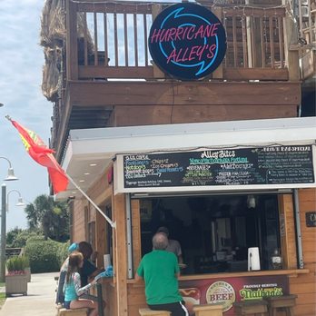 Alley Bites - people sitting outside of a restaurant - Hot Dogs Near Me - Carolina Beach, North Carolina Alley Bites - people sitting outside of a restaurant - Hot Dogs Near Me - Carolina Beach, North Carolina
