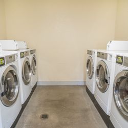 Scenic Drive RV Park and Campground - Front-load washers and dryers in the laundry room at Scenic Drive RV Park in Anniston, AL