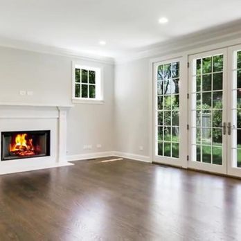 Zudor Flooring - New installed 3 1/4 red oak stained with one coat of dark walnut stain color and three coats of Bona Traffic water base satin finish - Flooring Near Me