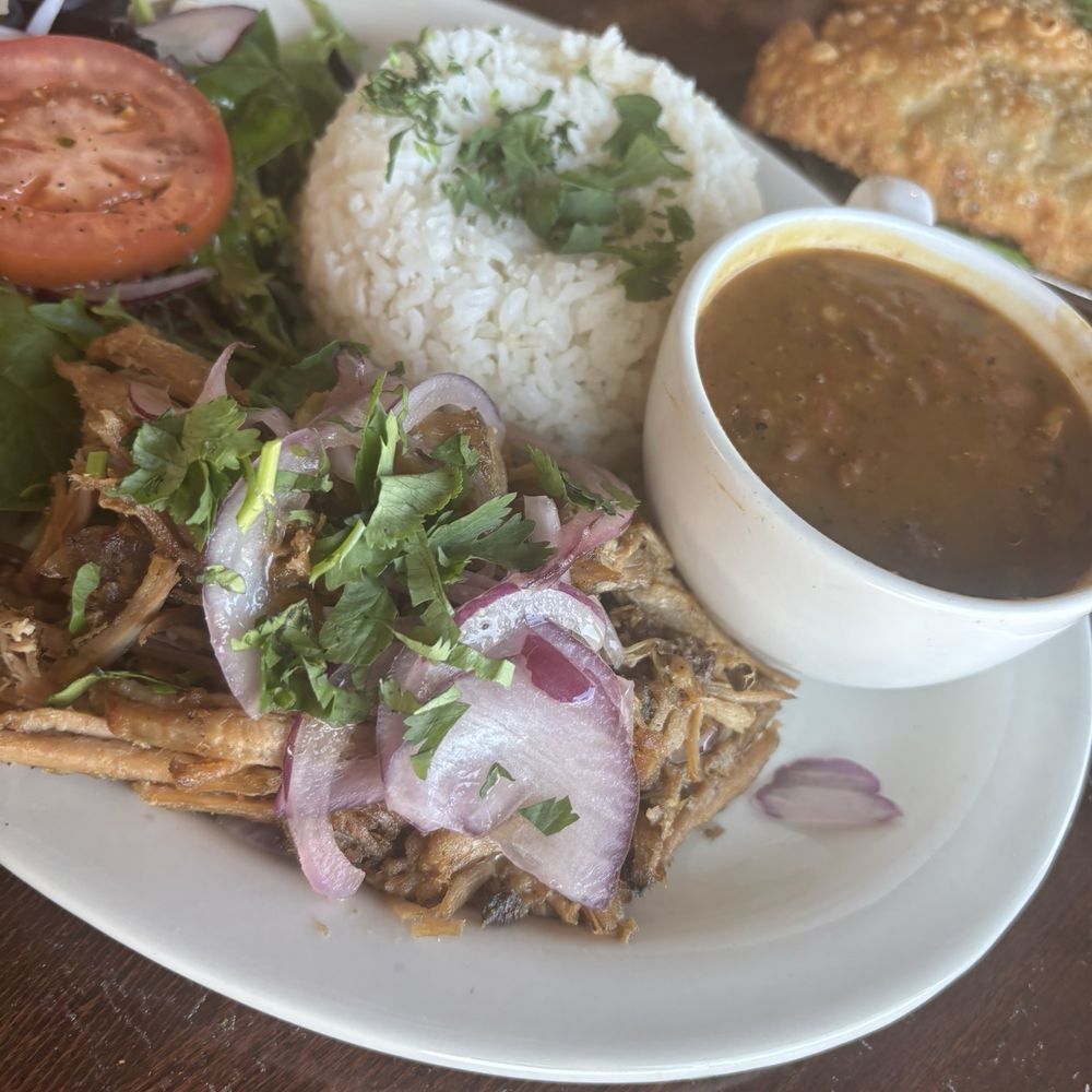 Elie’s Chinchorro - Roast pork plate - Puerto Rican Near Me - Omaha, Nebraska Elie’s Chinchorro - Roast pork plate - Puerto Rican Near Me - Omaha, Nebraska