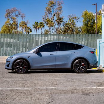 Toyz Detail Studio - The Model Y Performance's two front side windows received XPEL PRIME XR Plus, chosen to complement the factory rear privacy glass. - Car Window Tinting Near Me - Irvine, California Toyz Detail Studio - The Model Y Performance's two front side windows received XPEL PRIME XR Plus, chosen to complement the factory rear privacy glass. - Car Window Tinting Near Me - Irvine, California