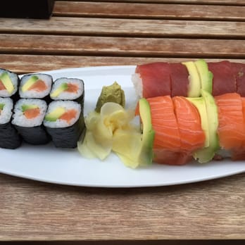 Barfüsser - Rainbow rolls (on right) and salmon avocado maki (on left) - Sushi Bars Near Me - Zürich, ZH Barfüsser - Rainbow rolls (on right) and salmon avocado maki (on left) - Sushi Bars Near Me - Zürich, ZH