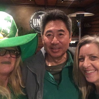 Union Kitchen and Tap Encinitas - Celebrating St Patrick's Day! Had to take a photo with the waitress (left) who served drinks with a green lipstick smile. - New American Near Me - Encinitas, California