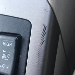 Fonzarelli's Collision & Auto Repair - gouge in the console.