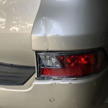 Front Range Bumper Solutions - dent and light before - Body Shops Near Me