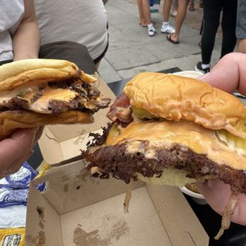 For The Win - Single cheeseburger on left and double bacon cheeseburger on the right. - Burgers Near Me - San Diego, California For The Win - Single cheeseburger on left and double bacon cheeseburger on the right. - Burgers Near Me - San Diego, California