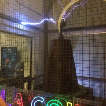 Griffith Observatory - Tesla coil activated and inducing current in neon sign. - Observatories Near Me - Los Angeles, California Griffith Observatory - Tesla coil activated and inducing current in neon sign. - Observatories Near Me - Los Angeles, California
