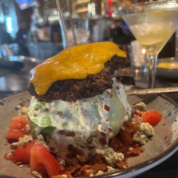Reunion Kitchen + Drink - Wedge Salad with Cheeseburger patty with Cheddar Cheese - New American Near Me - Corona, California Reunion Kitchen + Drink - Wedge Salad with Cheeseburger patty with Cheddar Cheese - New American Near Me - Corona, California