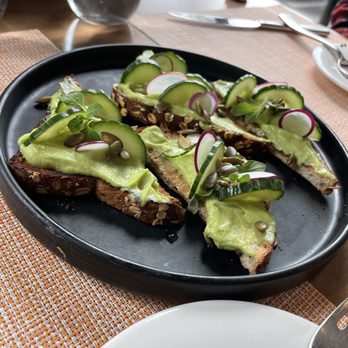 The CIA at Copia - Avocado bruschetta with cucumbers, radishes and mint. (You can also add eggs if desired) - Cooking Schools Near Me - Napa, California The CIA at Copia - Avocado bruschetta with cucumbers, radishes and mint. (You can also add eggs if desired) - Cooking Schools Near Me - Napa, California