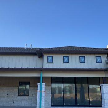 Austinite Rain Gutters - Seamless 6" Kstyle Gutter with opening for a drainage being put in by contractor - Gutter Services Near Me Austinite Rain Gutters - Seamless 6" Kstyle Gutter with opening for a drainage being put in by contractor - Gutter Services Near Me