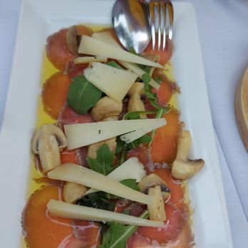 La Vinia - Carpaccio de Ternera: Veal Carpaccio with Manchego and Mushrooms - $19.75 (4.5 stars) - Spanish Near Me - Toronto, Ontario