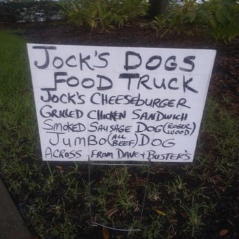 Jocks Dogs & More - a sign on the side of the road - Food Trucks Near Me