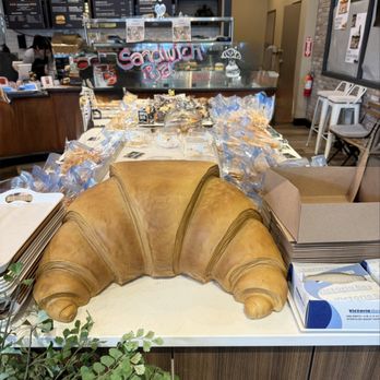 Bakery Museum & Co - Love the huge croissant at the end of the pastry table. - Cafes Near Me - Fairfax, Virginia Bakery Museum & Co - Love the huge croissant at the end of the pastry table. - Cafes Near Me - Fairfax, Virginia
