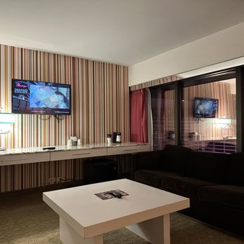 Flamingo Las Vegas - Image of the seating area and desk shelf. (A refrigerator is under the desk shelf.) - Hotels Near Me - Las Vegas, Nevada