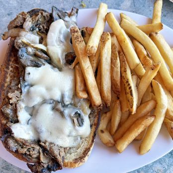 Old Salty Dog - Philly cheesesteak sandwich & fries - Seafood Near Me - Venice, Florida Old Salty Dog - Philly cheesesteak sandwich & fries - Seafood Near Me - Venice, Florida