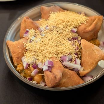 Masala Bae - Samosa chaat, an absolute favorite with the 2 side sauces not pictured - Indian Near Me - Tustin, California Masala Bae - Samosa chaat, an absolute favorite with the 2 side sauces not pictured - Indian Near Me - Tustin, California