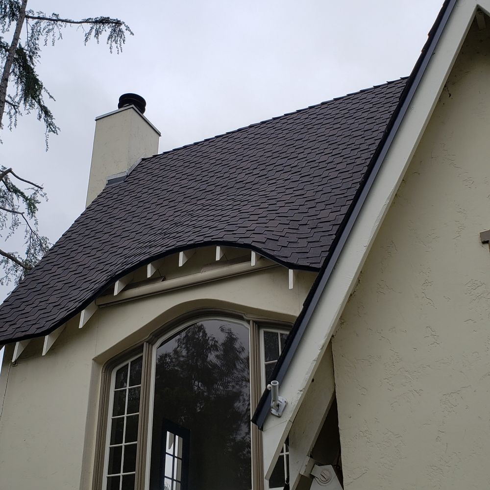 Slide of A&M Roofing