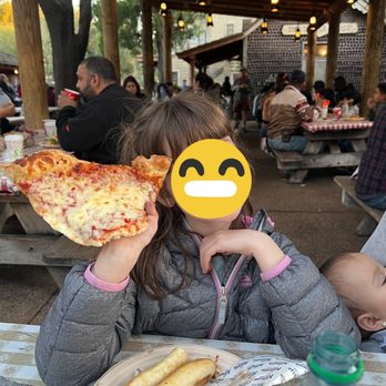 Calico Tater Bites - My eldest's Cheese Pizza was bigger than her head lol and came with garlic breadsticks!! - Barbeque Near Me - Buena Park, California Calico Tater Bites - My eldest's Cheese Pizza was bigger than her head lol and came with garlic breadsticks!! - Barbeque Near Me - Buena Park, California