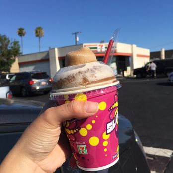 7-Eleven - a hand holding a cup of ice cream - Convenience Stores Near Me - Garden Grove, California 7-Eleven - a hand holding a cup of ice cream - Convenience Stores Near Me - Garden Grove, California
