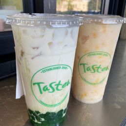 Jasmine milk tea with honey boba (left)