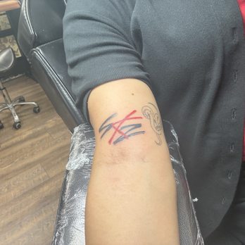 Next Level Studio - Original tattoo at the wrong angle - Piercing Near Me - Tempe, Arizona