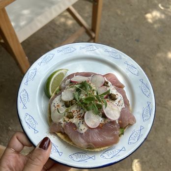 Mariscos Za Za Za - a person holding a plate of food - Seafood Near Me - Los Angeles, California