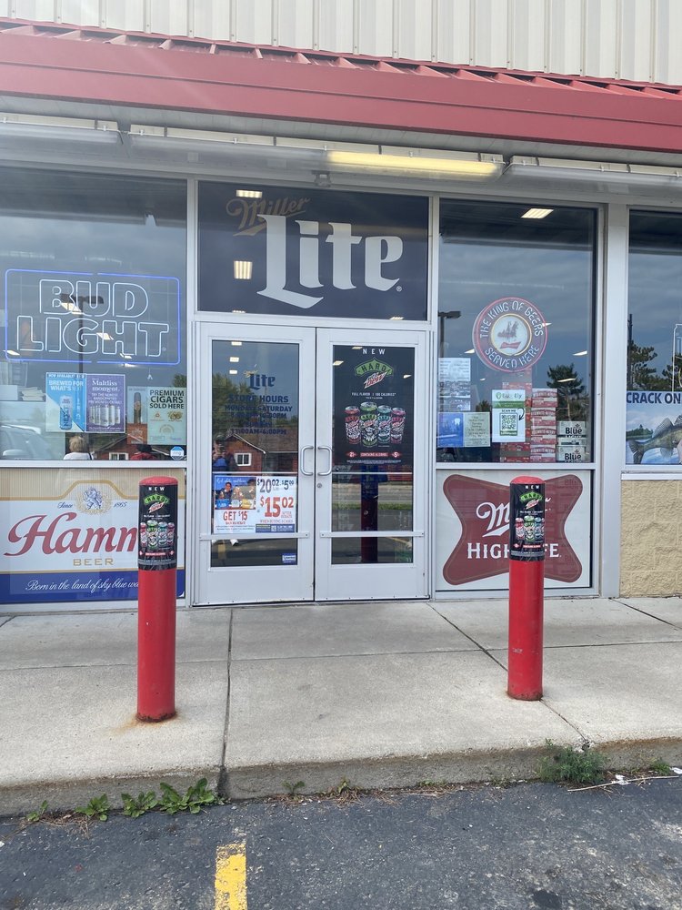 Ely Liquor Logo