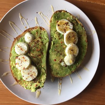 The Corner Beet - Avocado toast with sliced hard boiled egg and drizzled honey - Juice Bars & Smoothies Near Me - Denver, Colorado The Corner Beet - Avocado toast with sliced hard boiled egg and drizzled honey - Juice Bars & Smoothies Near Me - Denver, Colorado