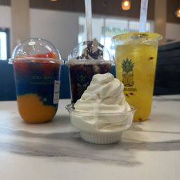 Sweet tooth Kinder bueno milkshake soft serve vanilla and lychee passion fruit refresher