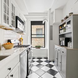 John Patrick Designs - Staging the kitchen to make it more streamlined. Originally had metal shelves.