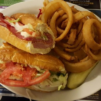 Metro Diner - Baked Italian hoagie with homemade onion rings - Diners Near Me - Gainesville, Florida
