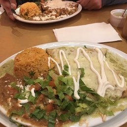 Enchiladas verdes and enchiladas rojas toward the back. Too much garnish or not enough salad? Enchiladas verdes and enchiladas rojas toward the back. Too much garnish or not enough salad?