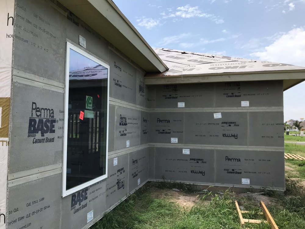 Slide of Excellence Roofing & Construction