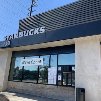 Starbucks - the front of a starbucks with a sign that says we're open - Coffee & Tea Near Me - Torrance, California