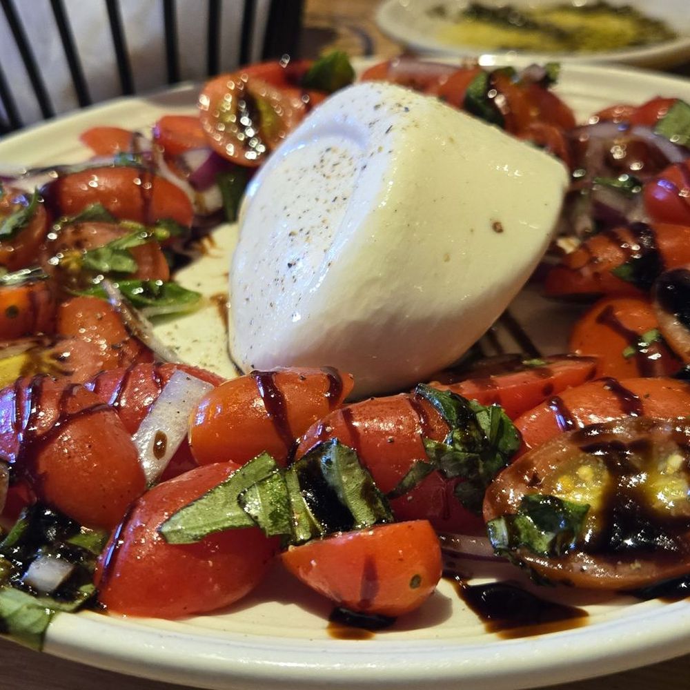 Carrabba's Italian Grill - Mozzarella  caprese  dish - Italian Near Me - Gainesville, Florida