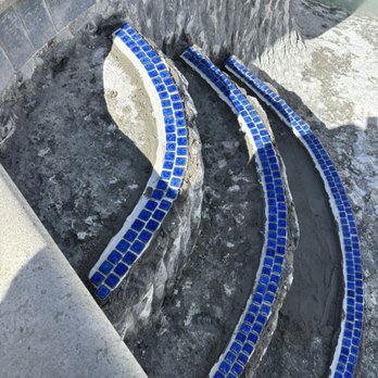 Omega Pool Remodeling - New tile around steps - Pool & Hot Tub Service Near Me - Los Angeles, California Omega Pool Remodeling - New tile around steps - Pool & Hot Tub Service Near Me - Los Angeles, California