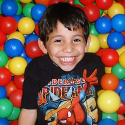 Therapy Center of Buda - One of our friends...playing in the ball pit.