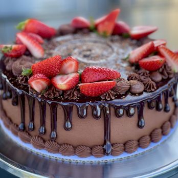 Wren's Nest Baking - a chocolate cake with strawberries on top - Bakeries Near Me - Ruston, Washington Wren's Nest Baking - a chocolate cake with strawberries on top - Bakeries Near Me - Ruston, Washington