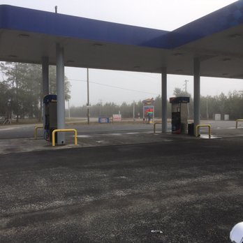Casey's Cove - a motorcycle parked in front of a gas station - Convenience Stores Near Me - Steinhatchee, Florida
