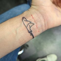 New Tribe Tattoo + Piercing